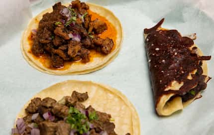 Basic Taco sells al pastor (top), fried cheese and bean (right) and carne asada tacos. We’re...