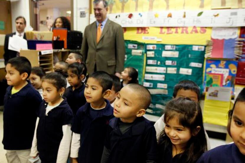 Mayor Mike Rawlings observes a Pre-K class at Joseph J. Rhoads Learning Center during a tour...