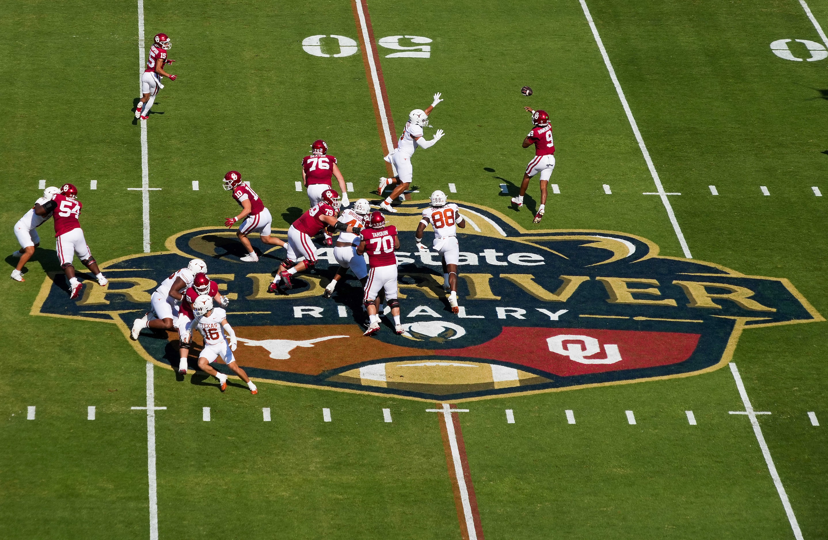 Oklahoma quarterback Michael Hawkins Jr. (9) throws a pass during the first half of an NCAA...