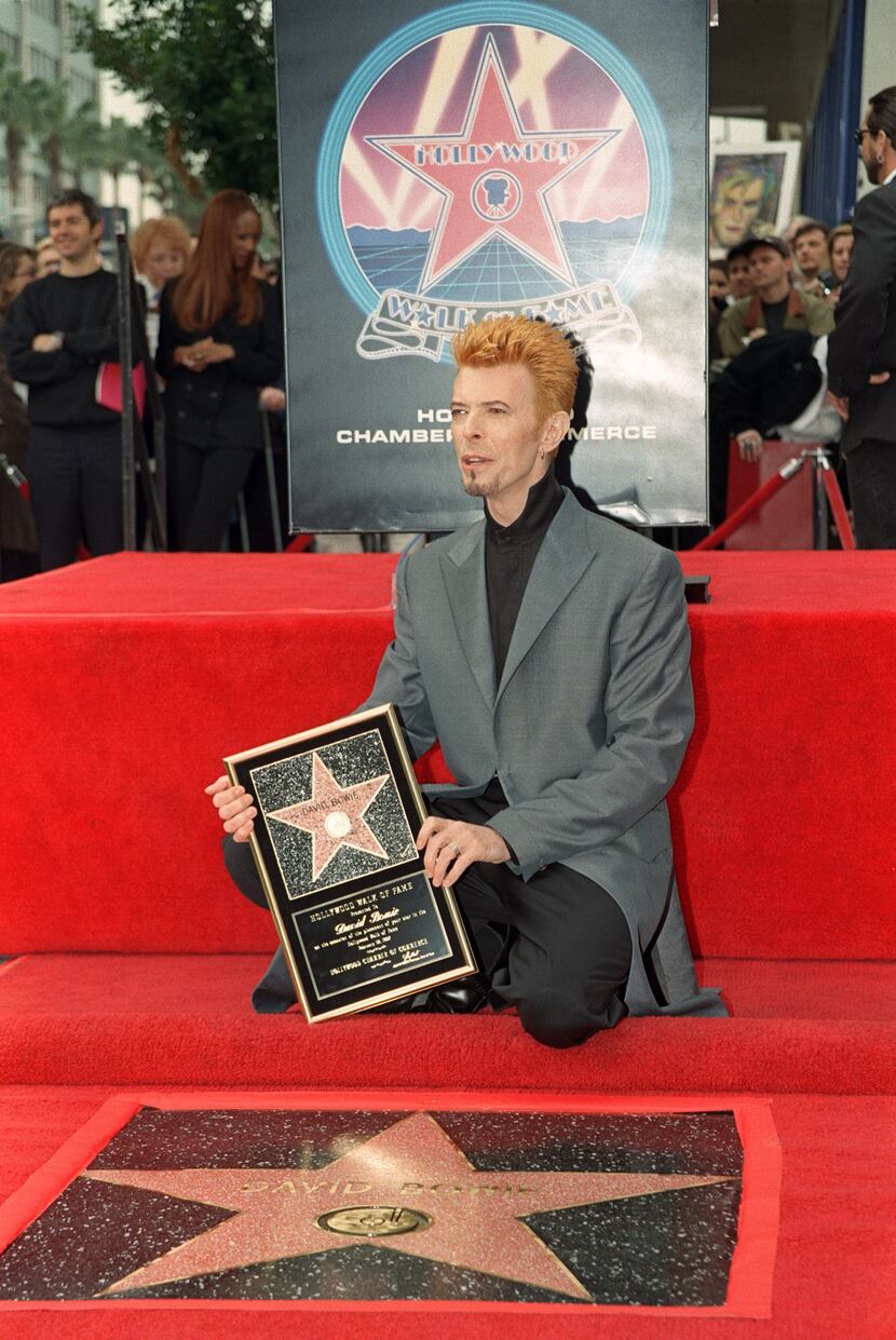 This file photo taken on February 12, 1997 shows British singer David Bowie posing for...
