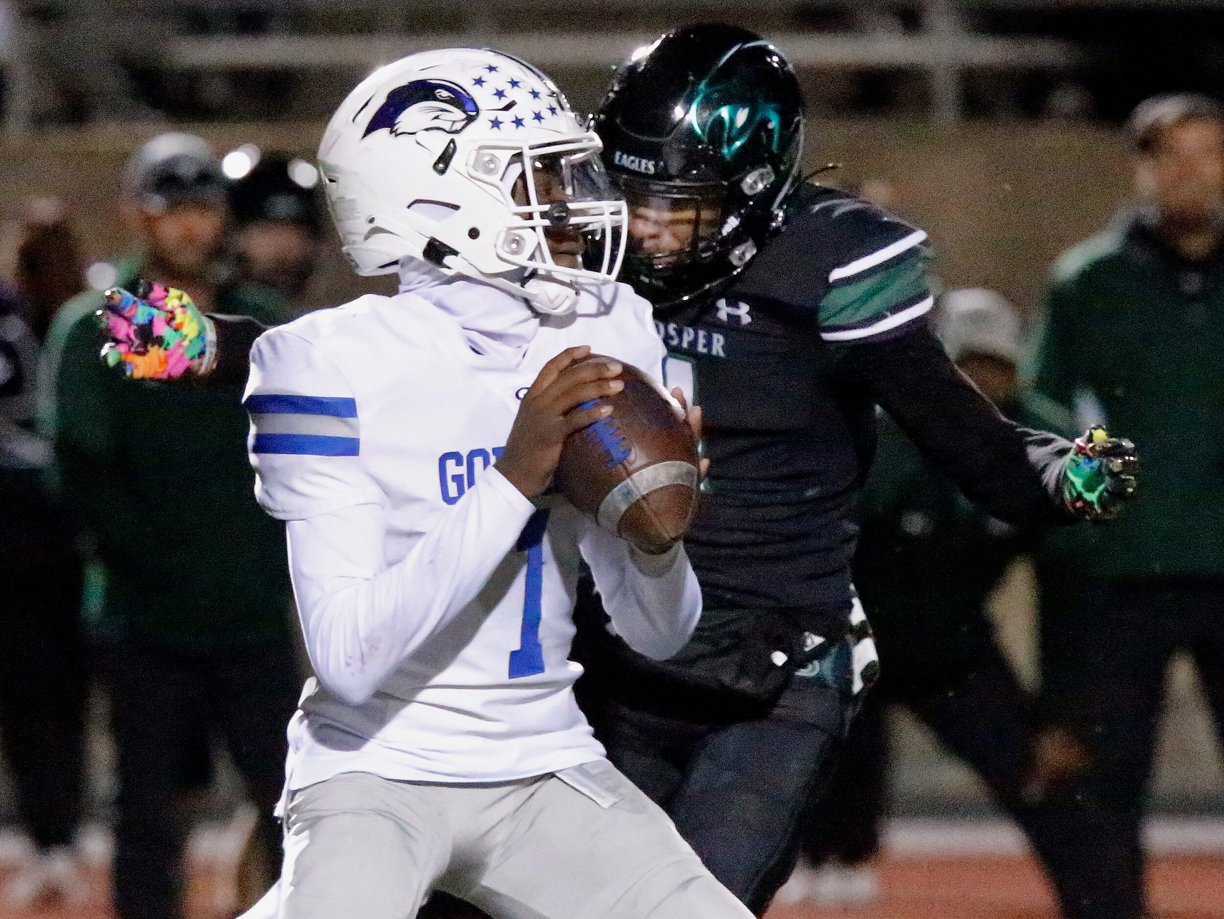 Grand Prairie High School quarterback Adrian Wilson (1) is sacked by Prosper High School...