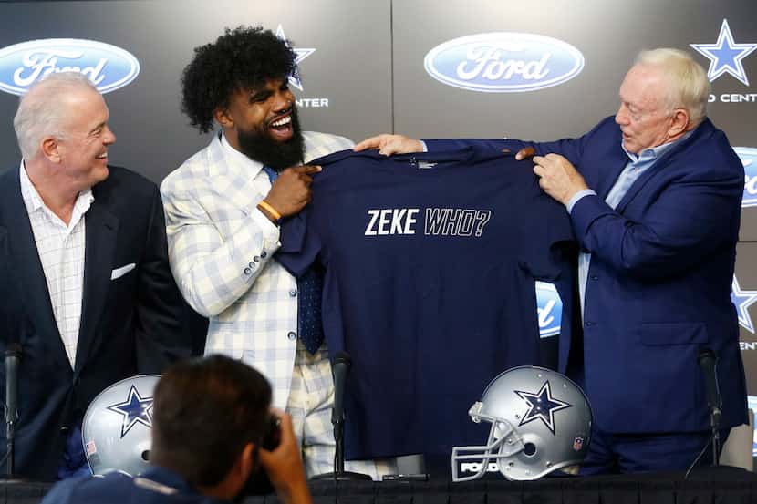 Dallas Cowboys owner and general manager Jerry Jones and Dallas Cowboys running back Ezekiel...