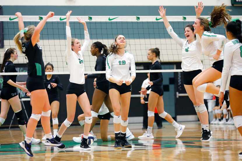 Southlake Carroll players celebrate a point during their first-round playoff victory against...