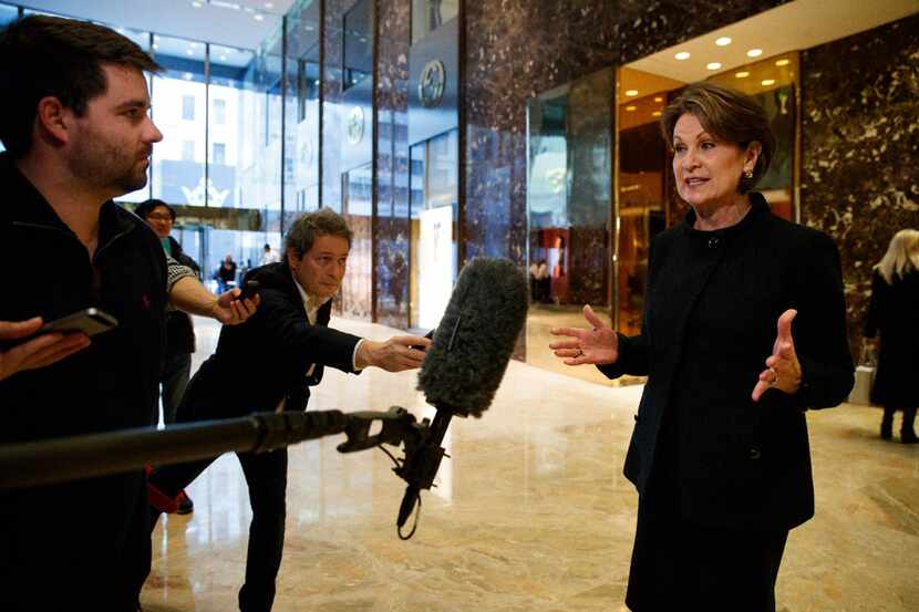 Lockheed Martin CEO Marillyn Hewson talks to reporters in the lobby of Trump Tower in New...