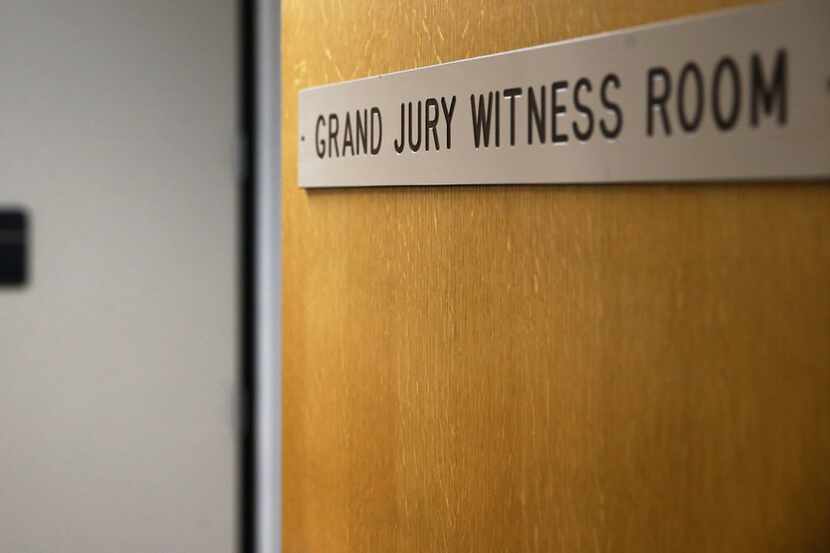 Grand jurors hear testimony in various witness rooms of the Frank Crowley Courts Building in...
