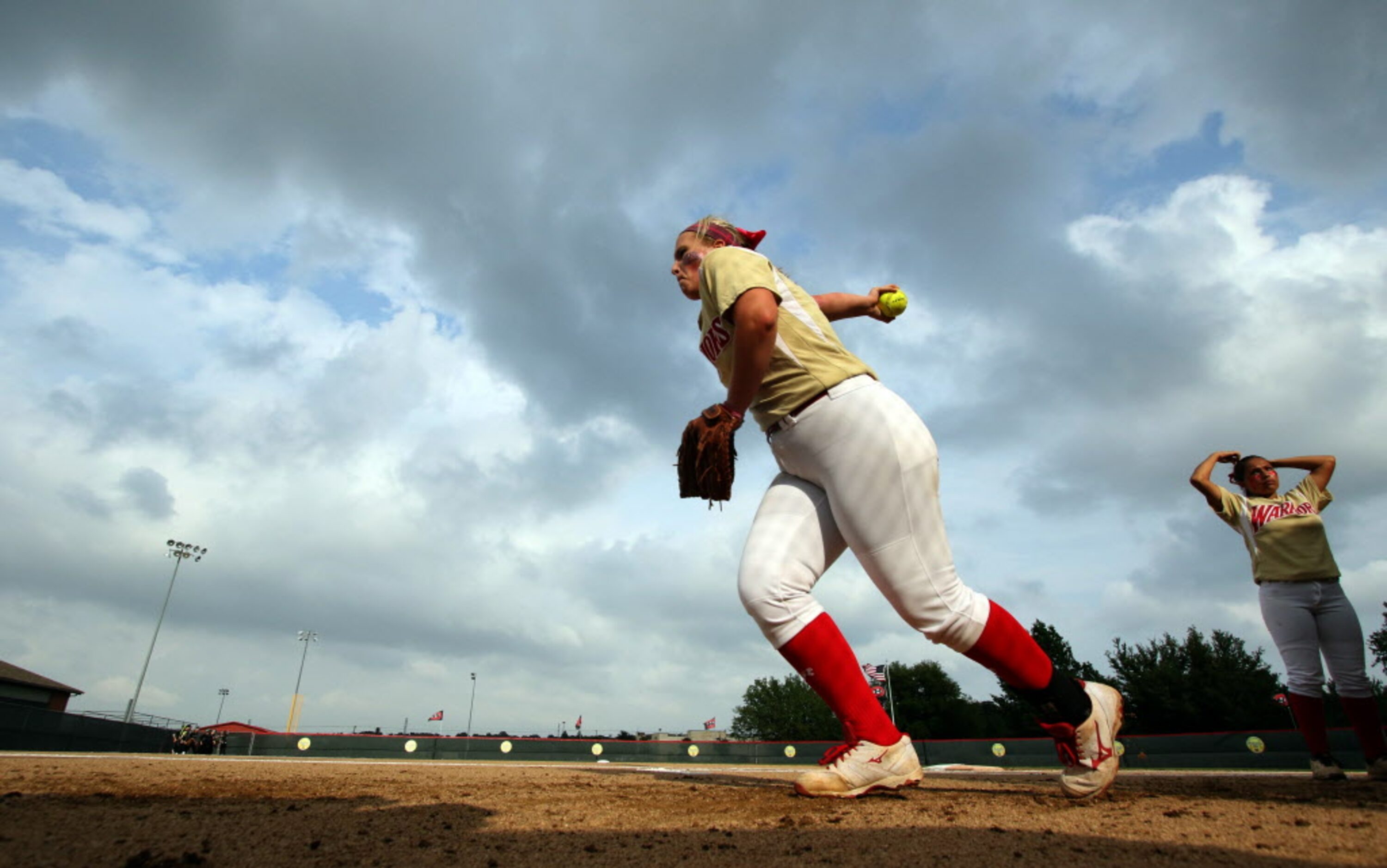 South Grand Prairie pitcher Haltom Shepherd (21) delivers a pitch during warm-ups prior to...