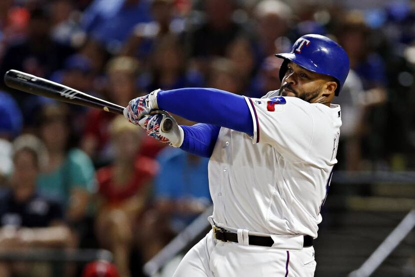 Texas Rangers designated hitter Prince Fielder strikes out during the ninth inning of...