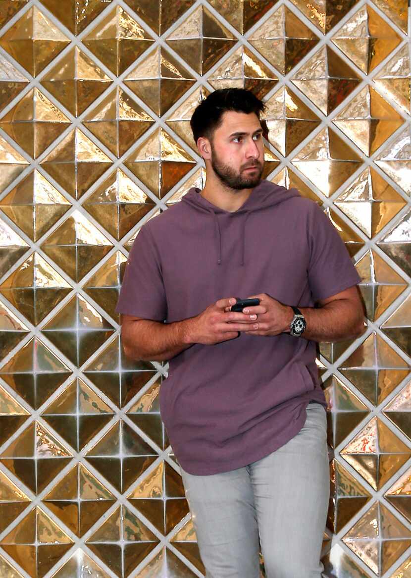 Texas Rangers first baseman Joey Gallo poses for a photograph on the Fremont Street area in...