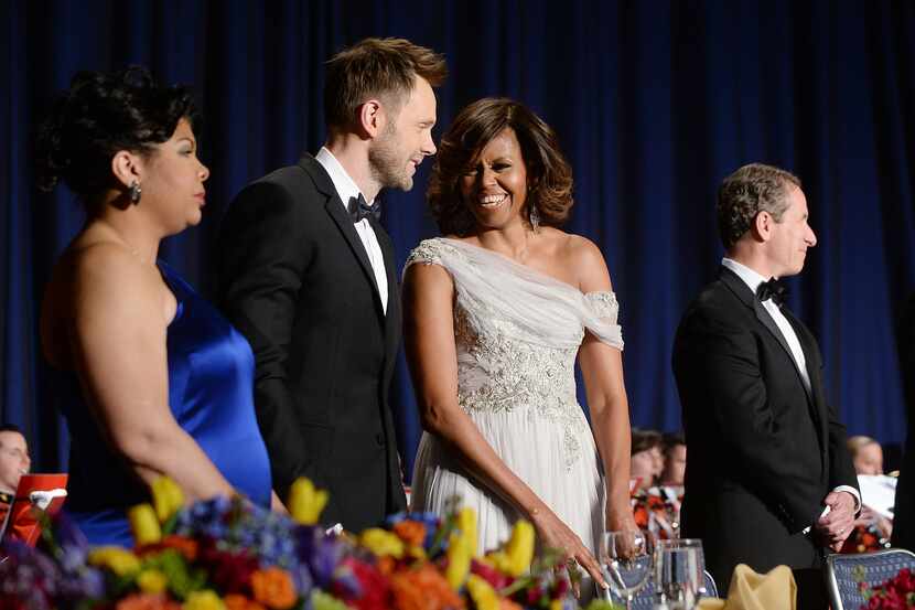 WASHINGTON, DC - MAY 3:  First lady Michelle Obama and Comedian Joel Mchale share a laugh on...