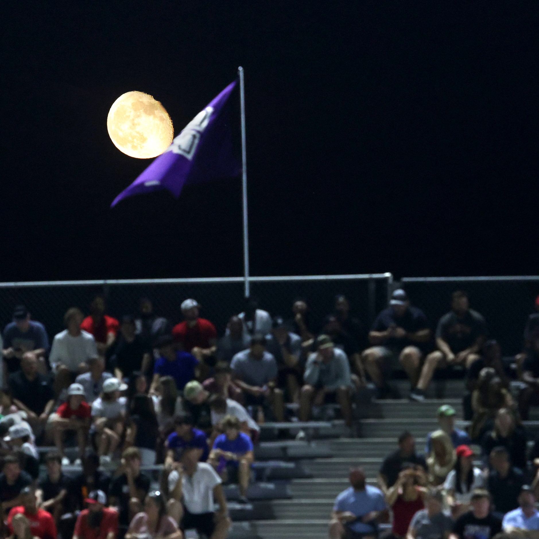 The moon rises over the football field during the Lovejoy High School at Anna High School...