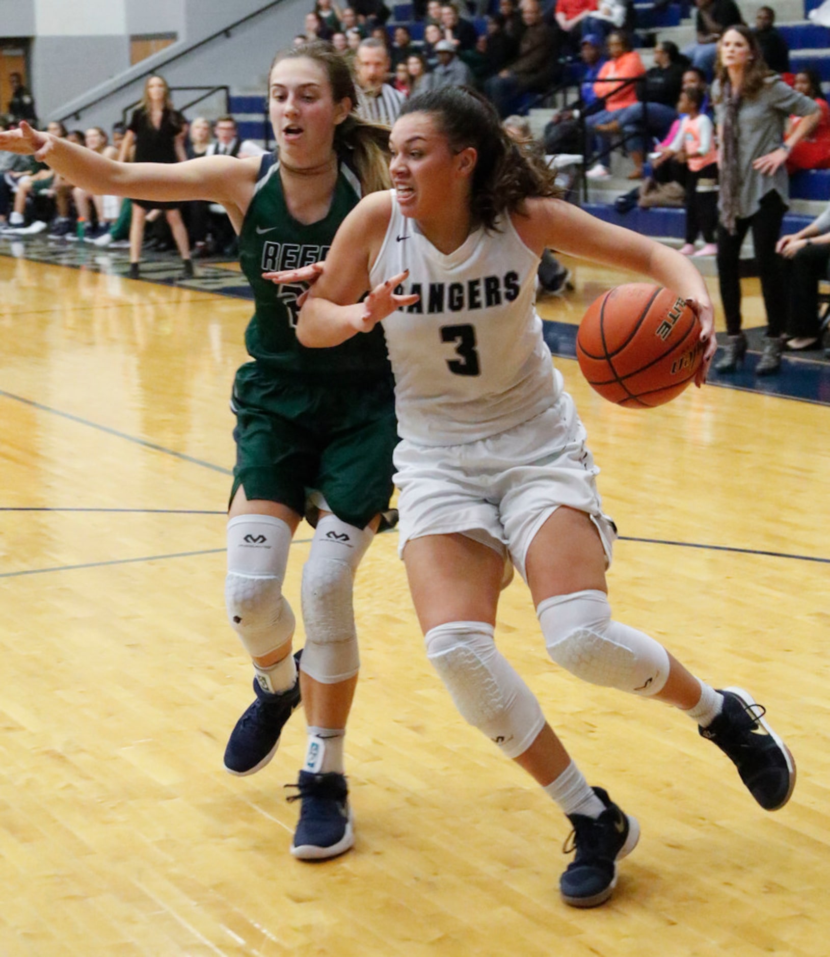 Frisco Reedy's Jadyn Bauss (25) puts pressure on Frisco Lone Star Mallory Adams (3) during...