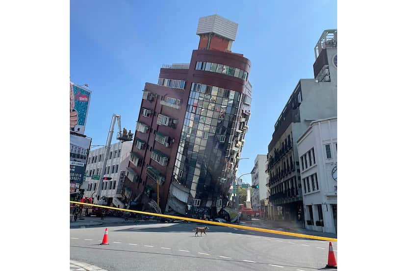 In this photo released by the Hualien City Government, a leaning building is cordoned off in...