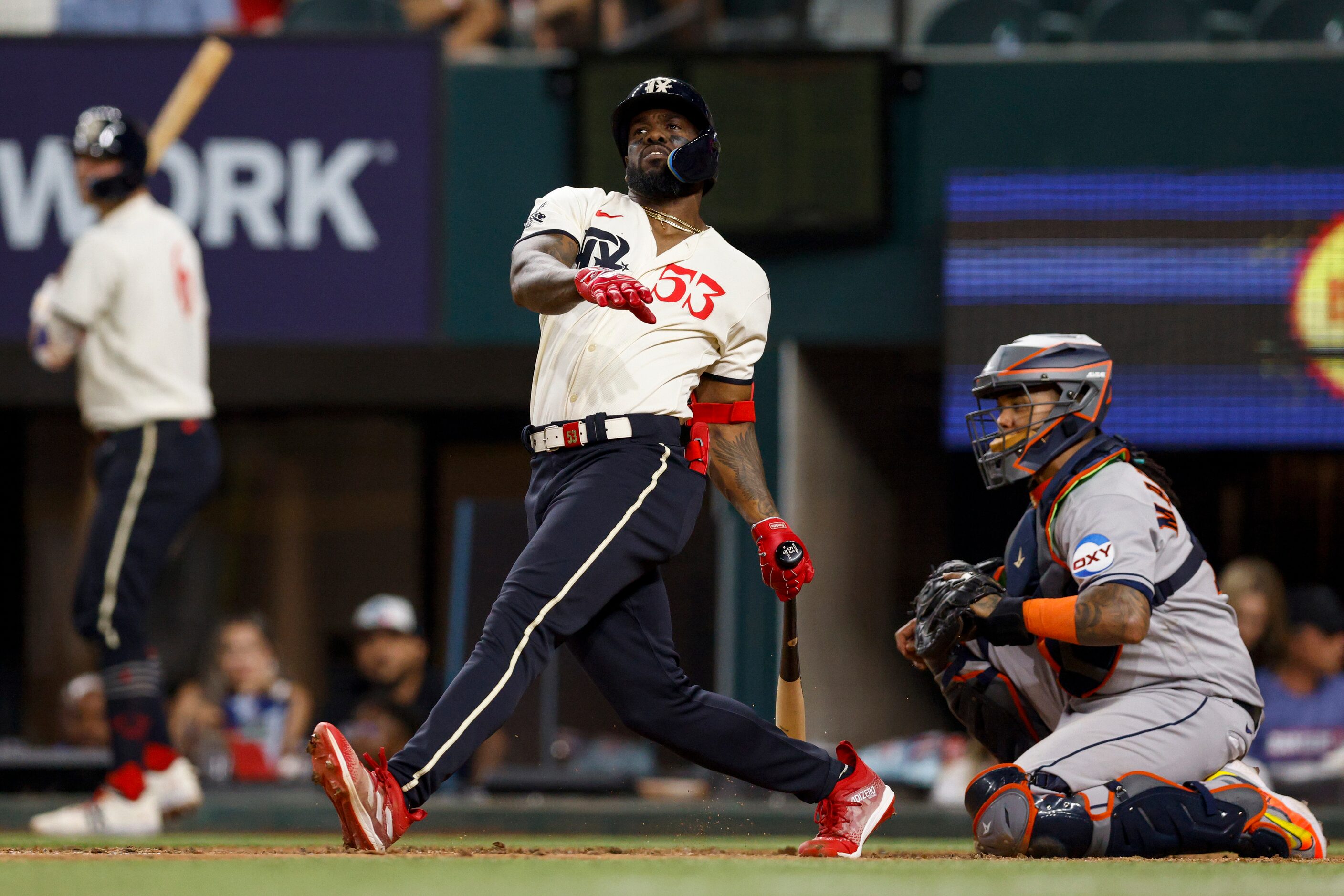 Texas Rangers right fielder Adolis Garcia (53) swings for a pitch during the eighth inning...