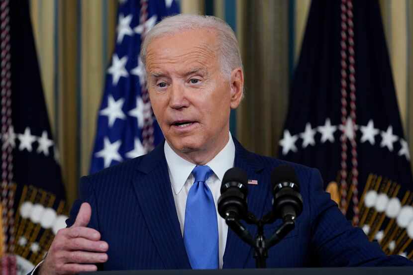 President Joe Biden speaks in the State Dining Room of the White House in Washington,...