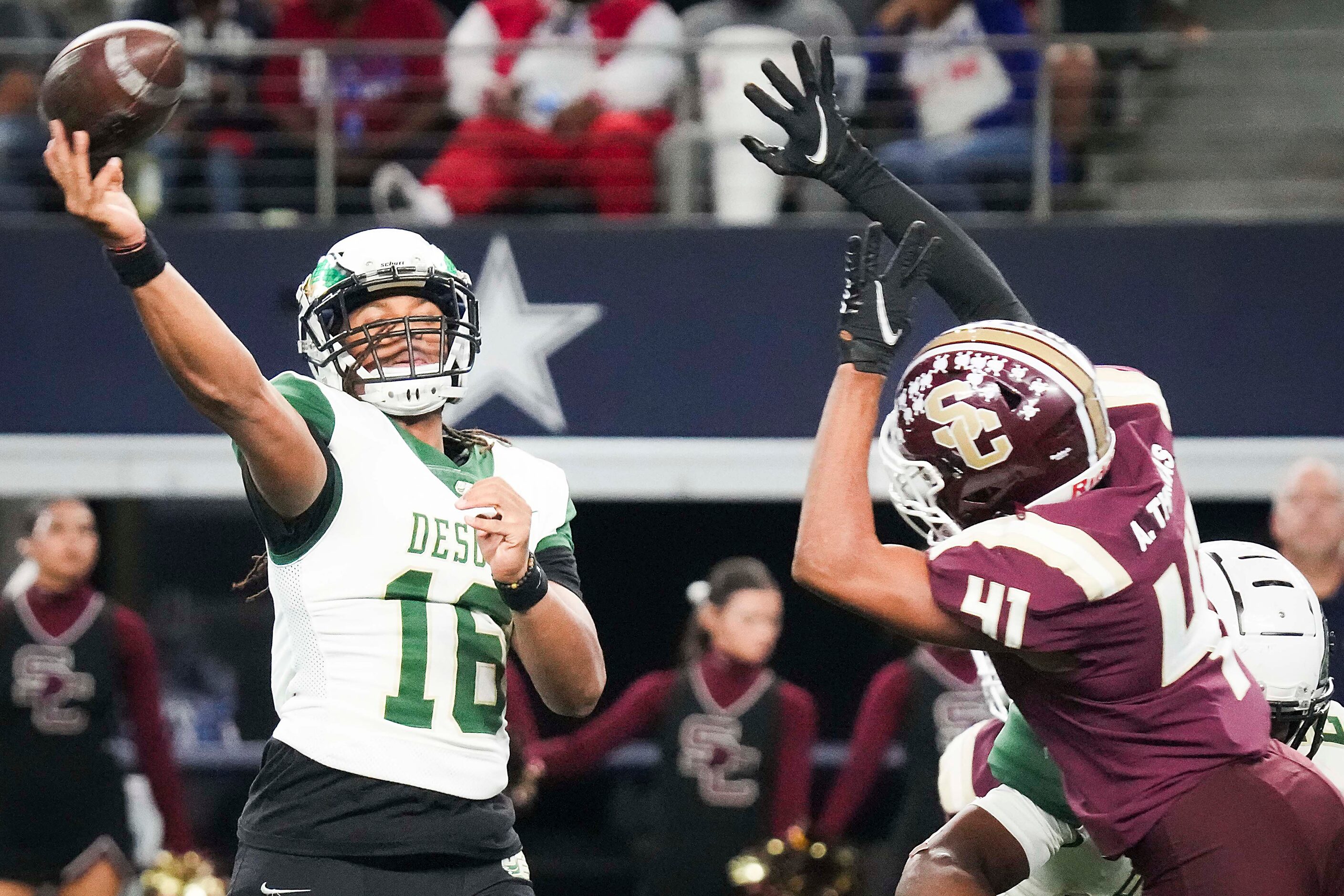 DeSoto quarterback Chad Williams (16) throws a touchdown pass over Humble Summer Creek...