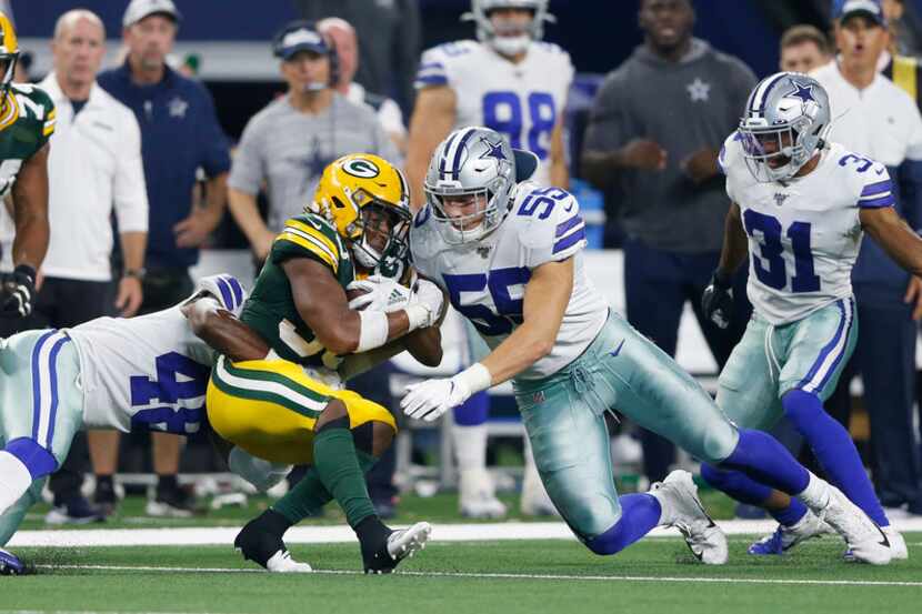 Dallas Cowboys outside linebacker Leighton Vander Esch (55) and Dallas Cowboys linebacker...