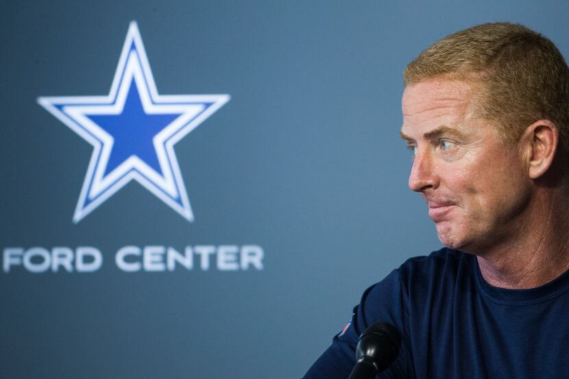 Dallas Cowboys head coach Jason Garrett answers questions during a press conference prior to...