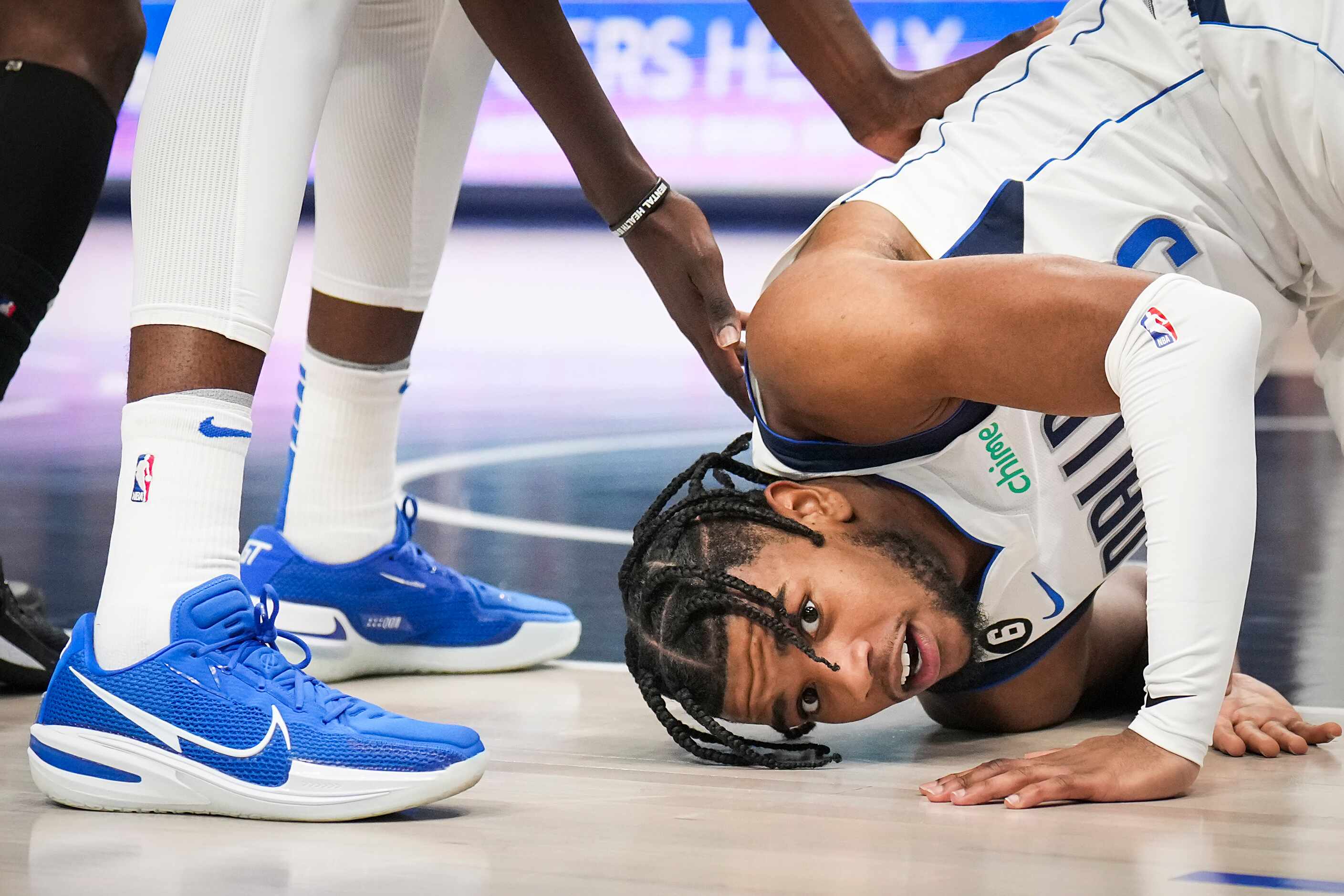Dallas Mavericks guard Jaden Hardy (3) looks up from the floor after being fouled during the...