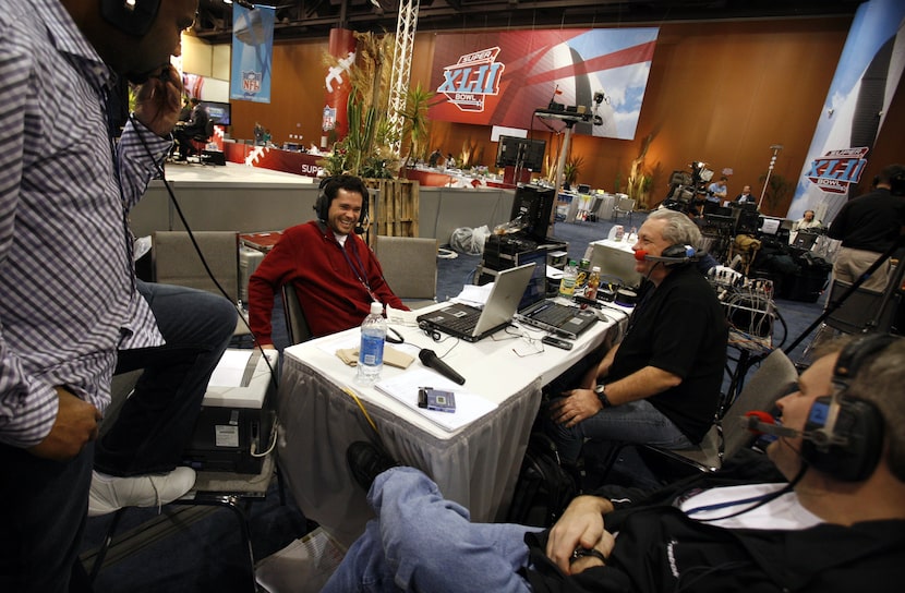 Mike Rhyner, right, and Corby Davidson shared a laugh at The Ticket's broadcast table at the...