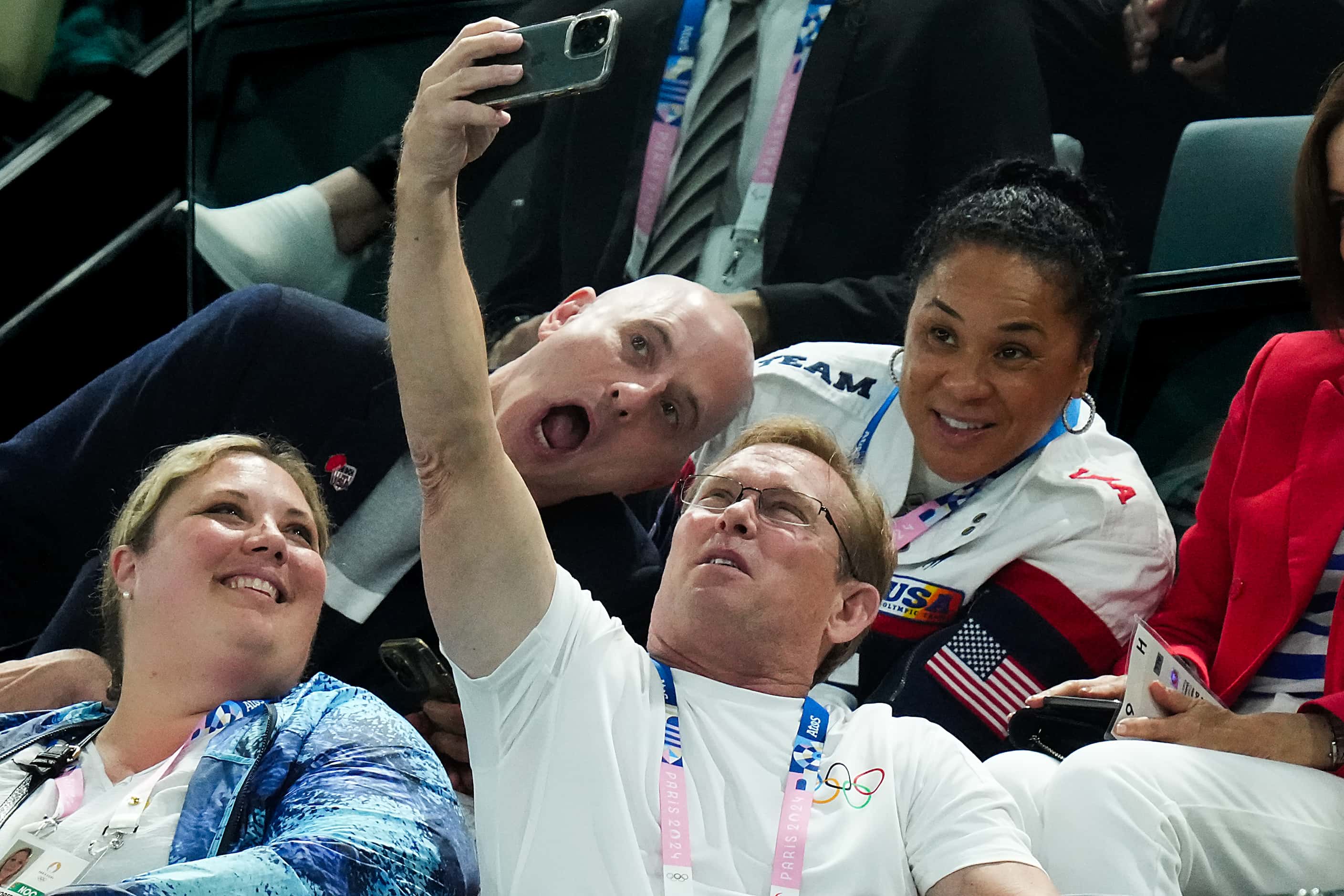 Bart Conner takes a selfie with Brian Boitano and Dawn Staley during men’s gymnastics...
