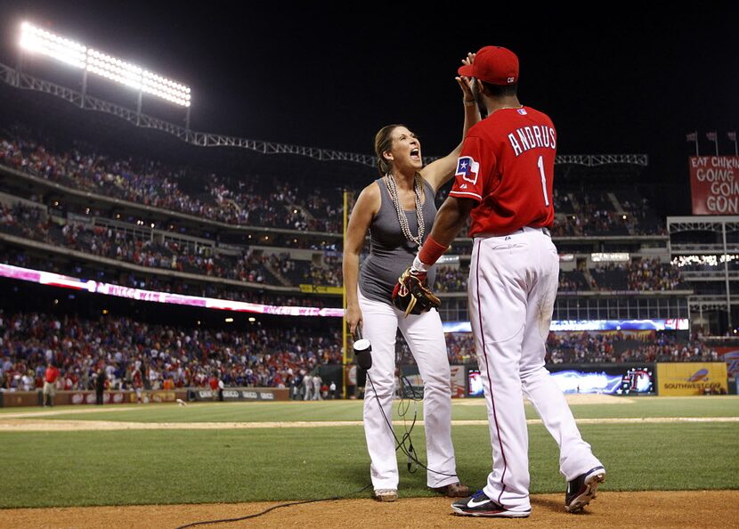 Texas Rangers shortstop Elvis Andrus (1) is congratulated on his 5-for-5 evening by Fox...