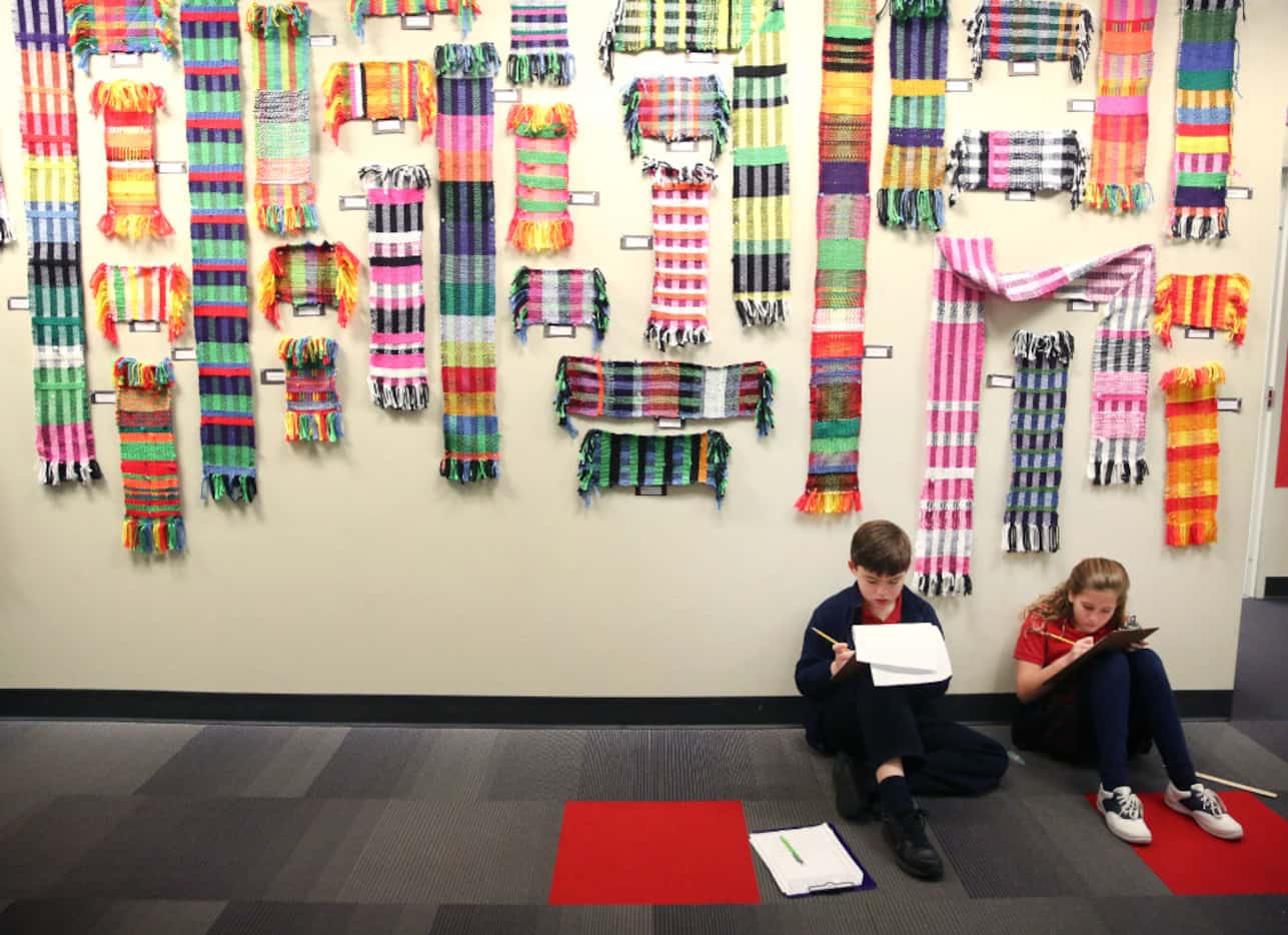 Fourth-grade students Jack Roueche and Alyson Grohman worked on a STEM assignment at Parish...