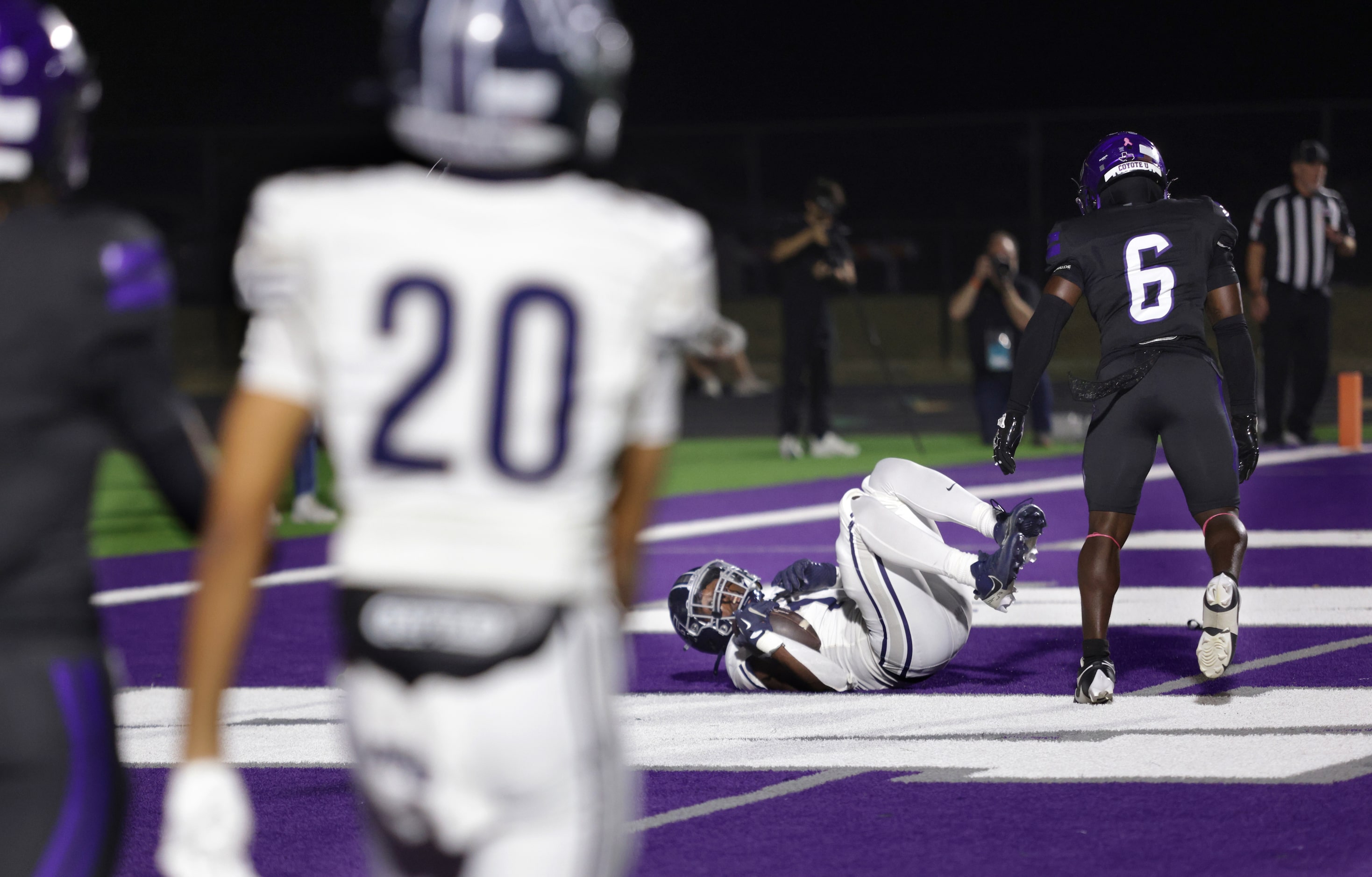 Walnut Grove player #1 Cam Newton tumbles into the endzone for a touchdown during the...