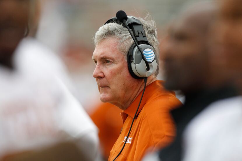 Texas Longhorns head coach Mack Brown watches during the second half of the Texas-OU...