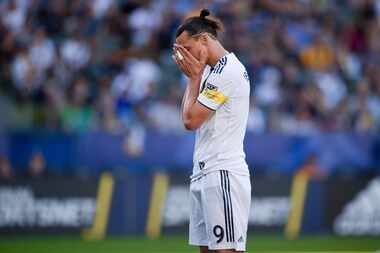 LA Galaxy forward Zlatan Ibrahimovic reacts after missing a pass during the first half of an...
