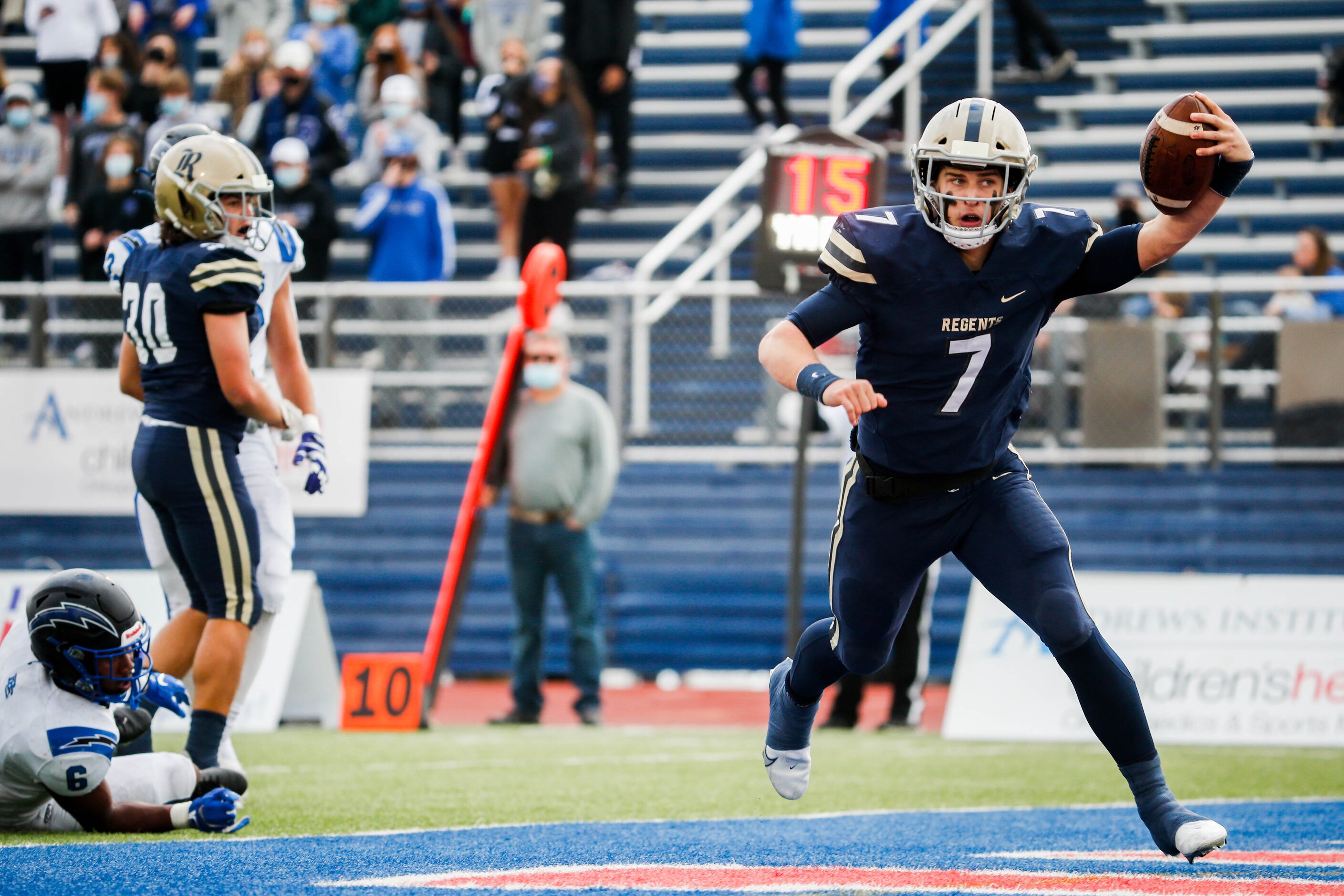 Austin Regents's quarterback Andrew Dickey (7) runs the ball for a touchdown against Dallas...