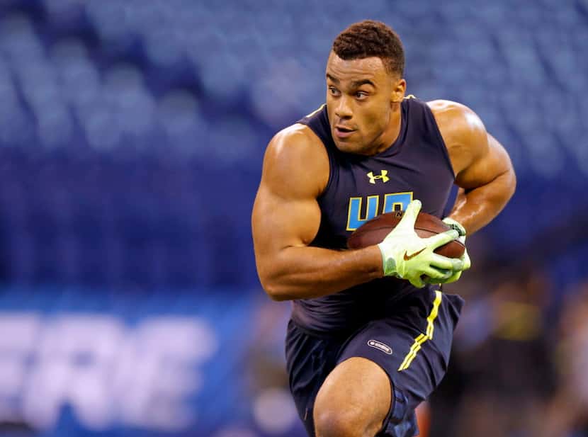 Stanford defensive end Solomon Thomas runs a drill at the NFL football scouting combine in...