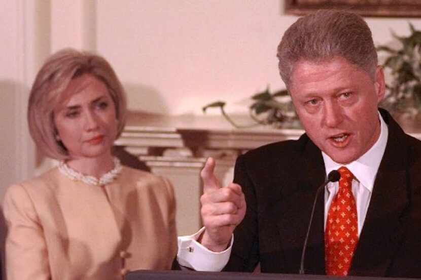 First lady Hillary Rodham Clinton with President Bill Clinton denies having sex with former...