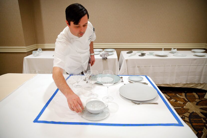 Ehlert gauges the space required for four place settings by laying pieces inside a 36-inch...