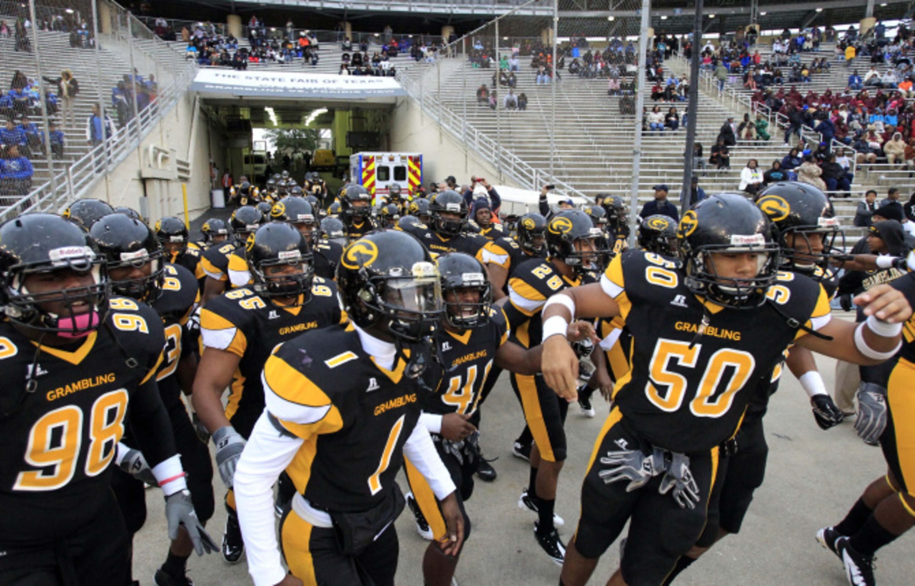 The Grambling team takes the field prior to  the start of a NCAA football game against...