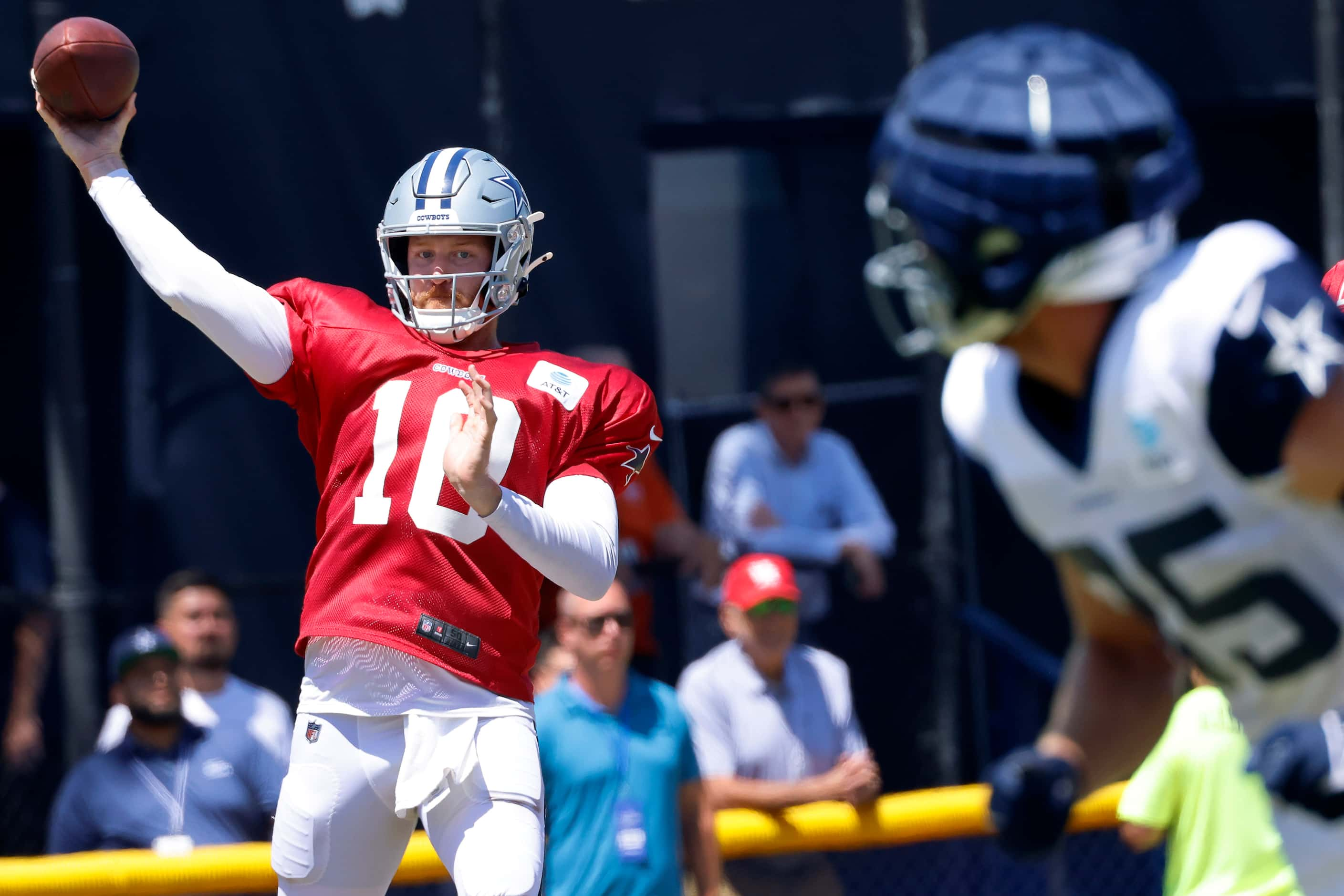 Dallas Cowboys quarterback Cooper Rush (10) throws a pass to wide receiver David Durden (85)...