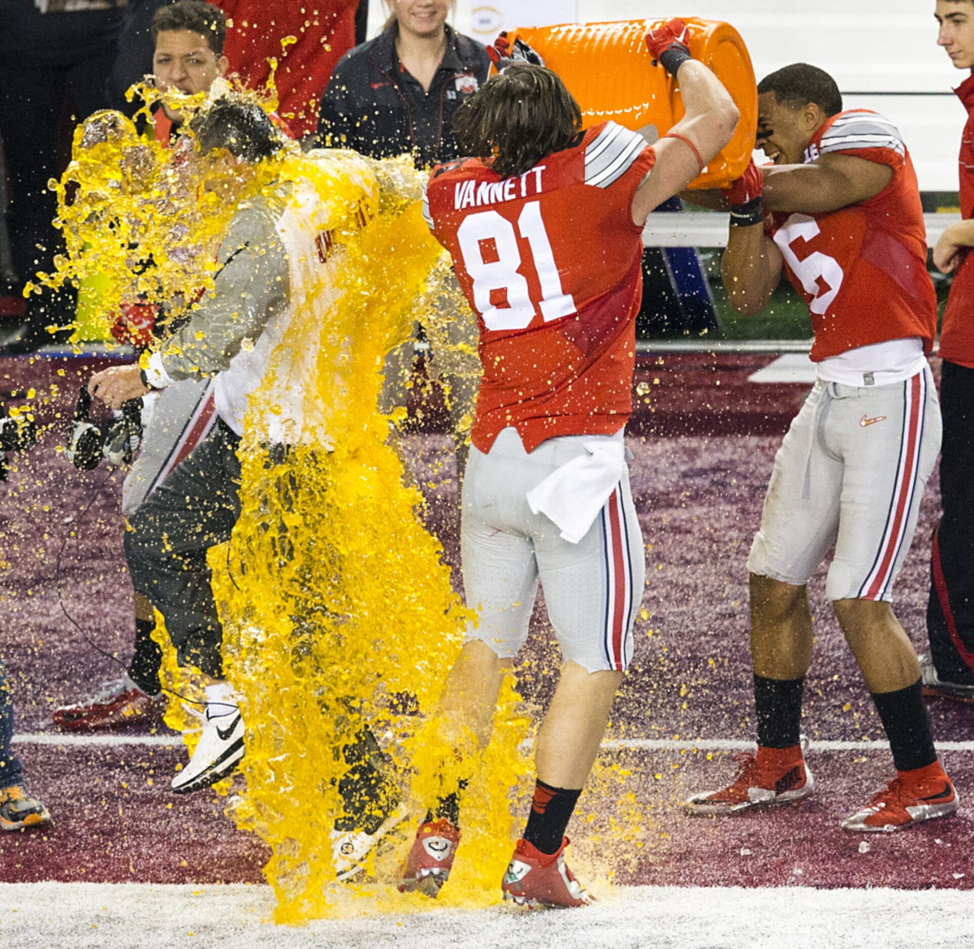 Ohio State Buckeyes head coach Urban Meyer can't escape a Gatorade bath from tight end Nick...