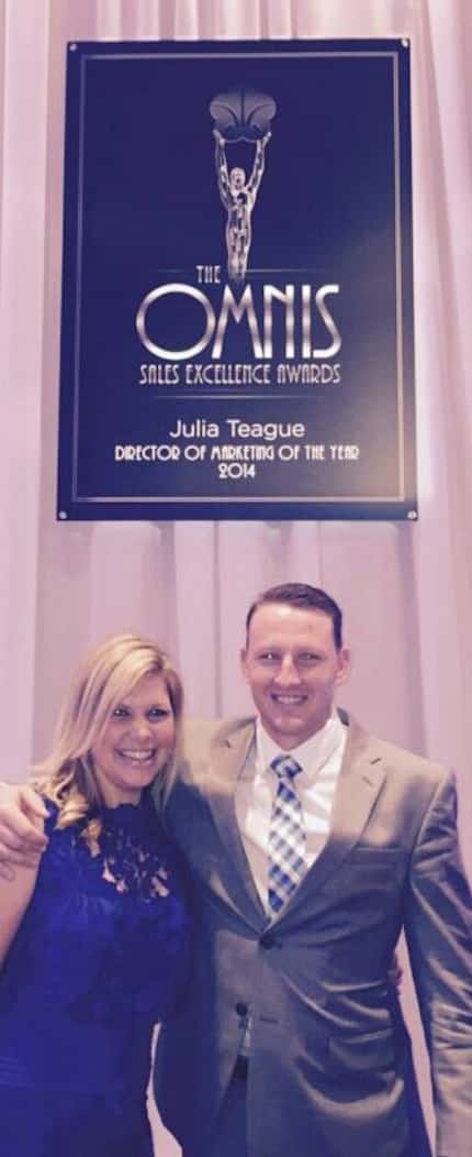Julia Teague (left) accepted a Director of Marketing of the Year award from Omni Hotels &...