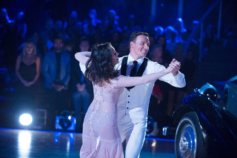 Cheryl Burke, left, and United States Olympic swimmer Ryan Lochte, perform on "Dancing with...