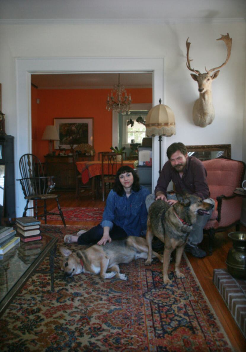 Art historian and gallery owner Cris Worley, artist Erick Swenson, dogs Rudy and Benson 
