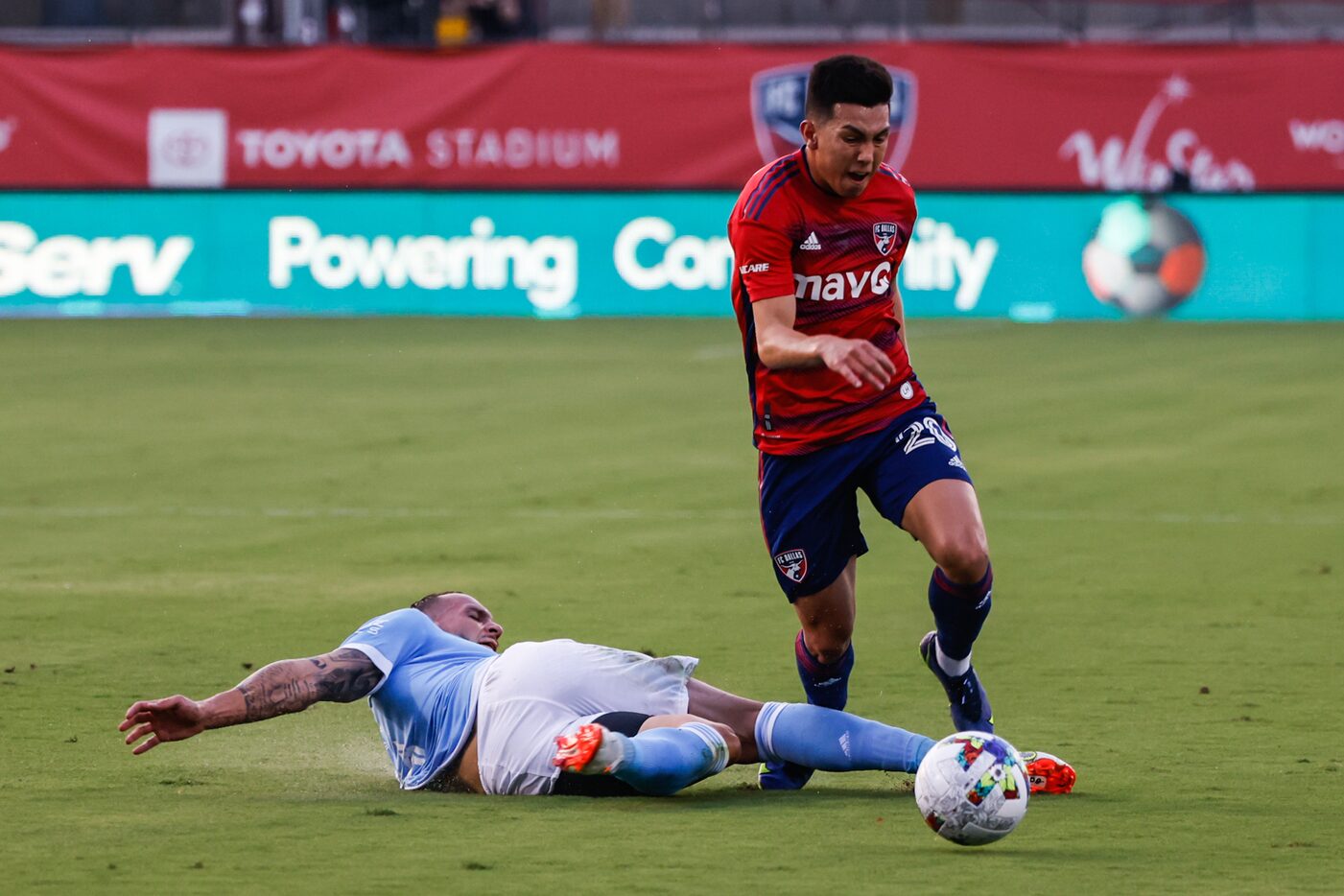 New York City defender Maxime Chanot (4) makes a faul over FC Dallas forward Alan Velasco...