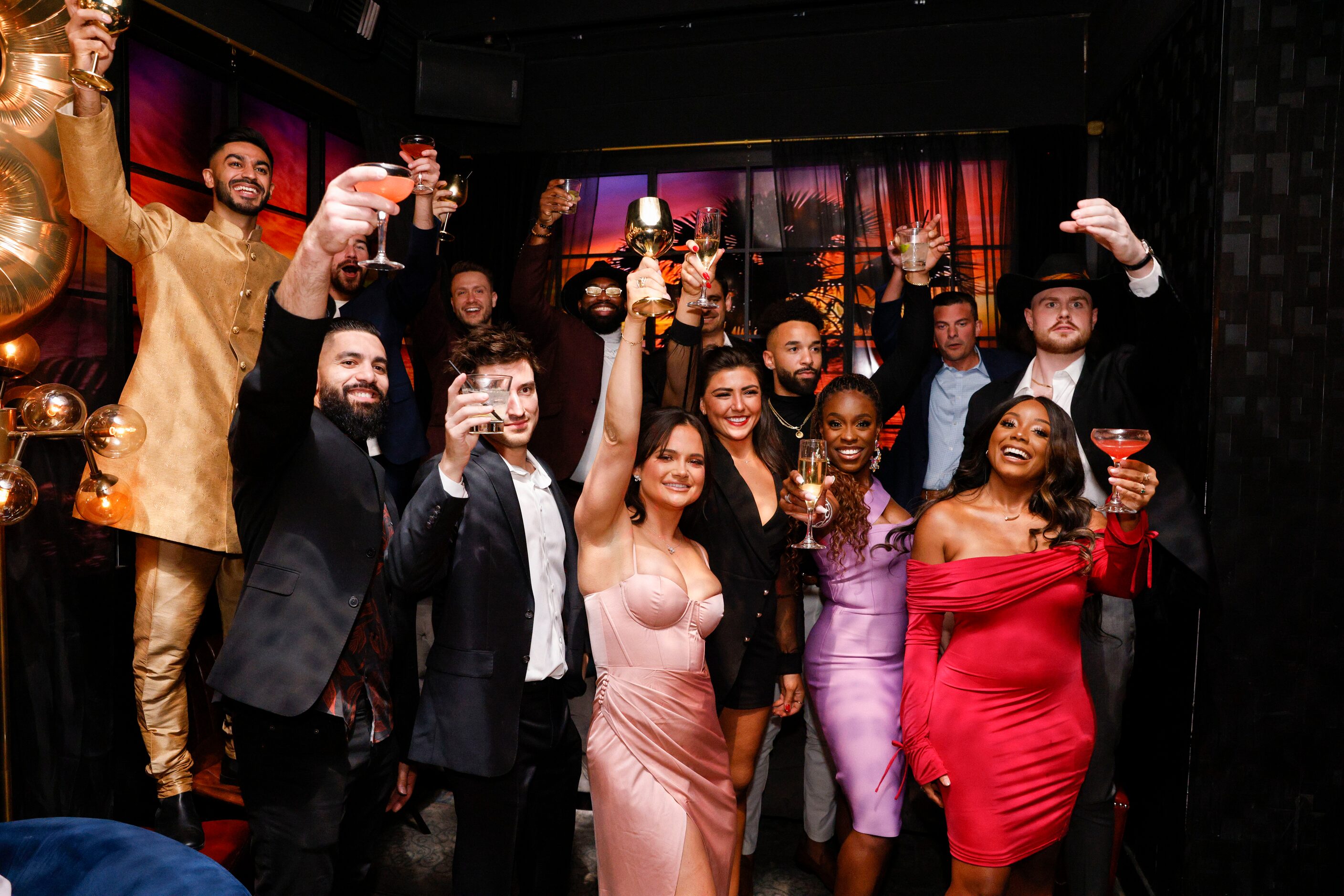 Love is Blind cast members toast during a watch party for the premiere of Love is Blind...