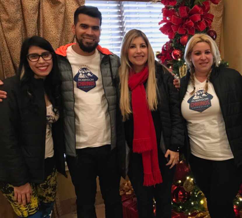 Rusmery Thais Chirinos de Blanco, far right, is seeking political asylum in Texas after...