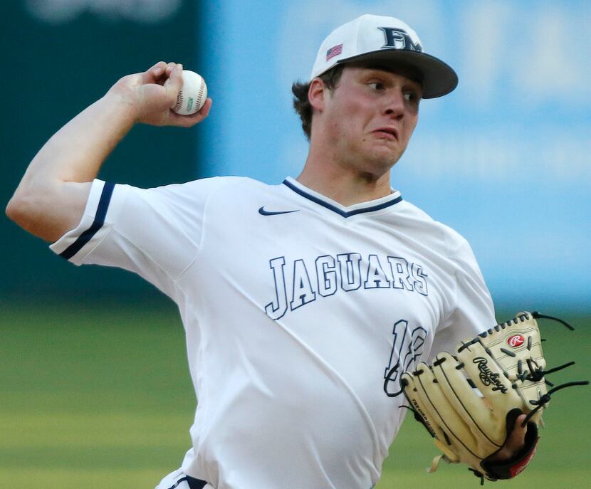 Flower Mound High School pitcher Cam Brown (18) throws a pitch in the first inning as Flower...
