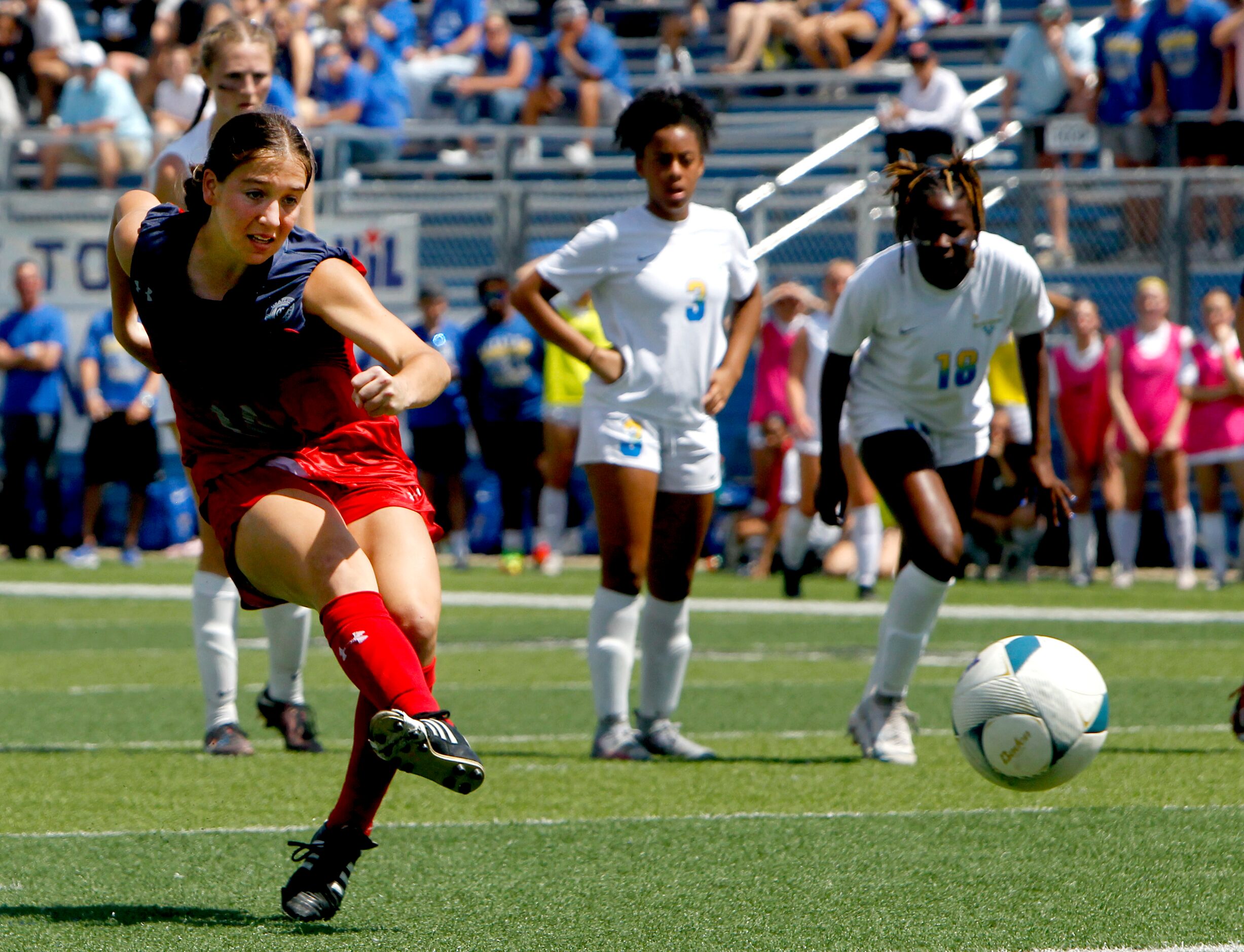 Grapevine forward Theresa McCullough (14) buries a penalty kick during the first half of...