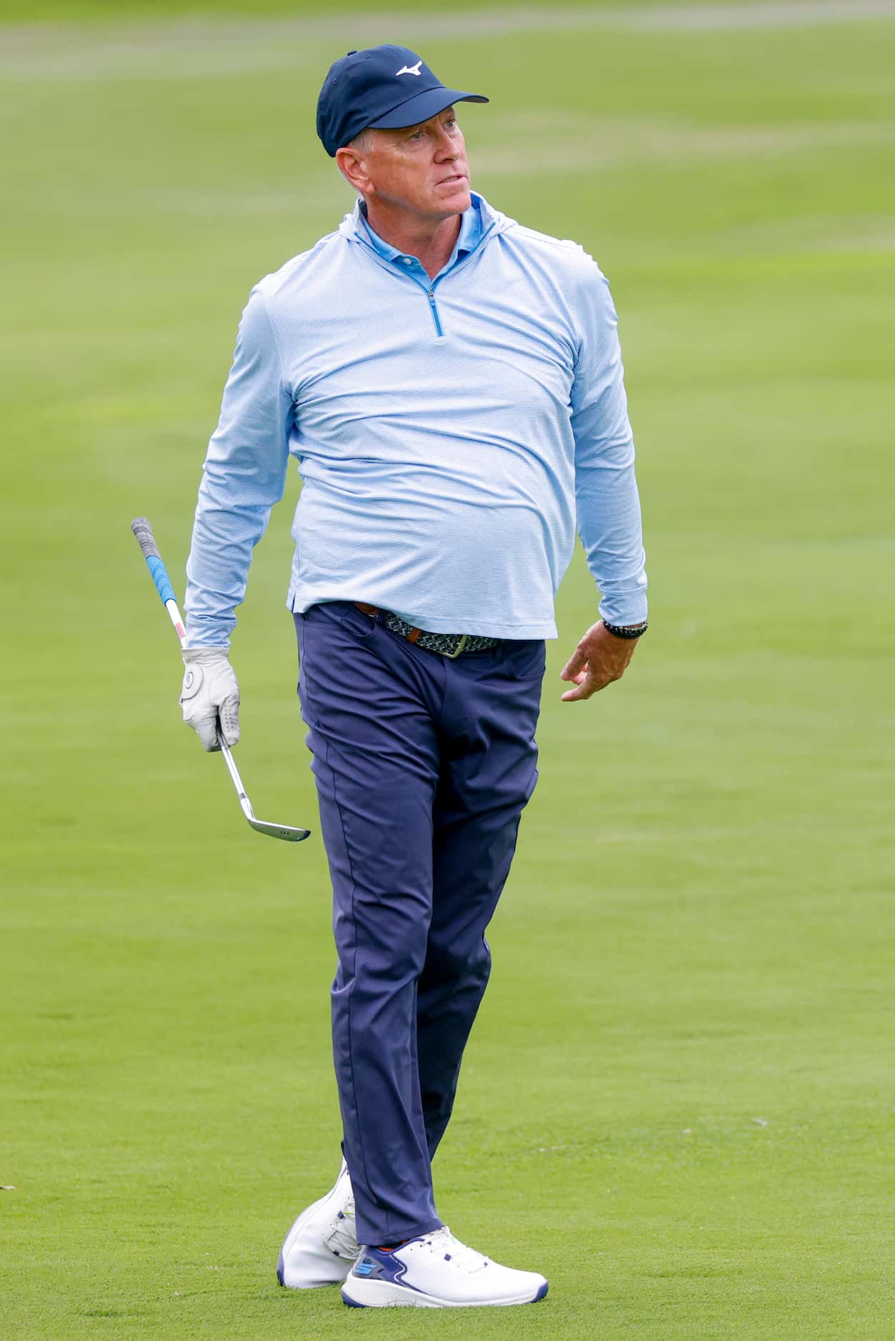 Former MLB pitcher Tom Glavine watches his shot on the 9th fairway during the first round of...