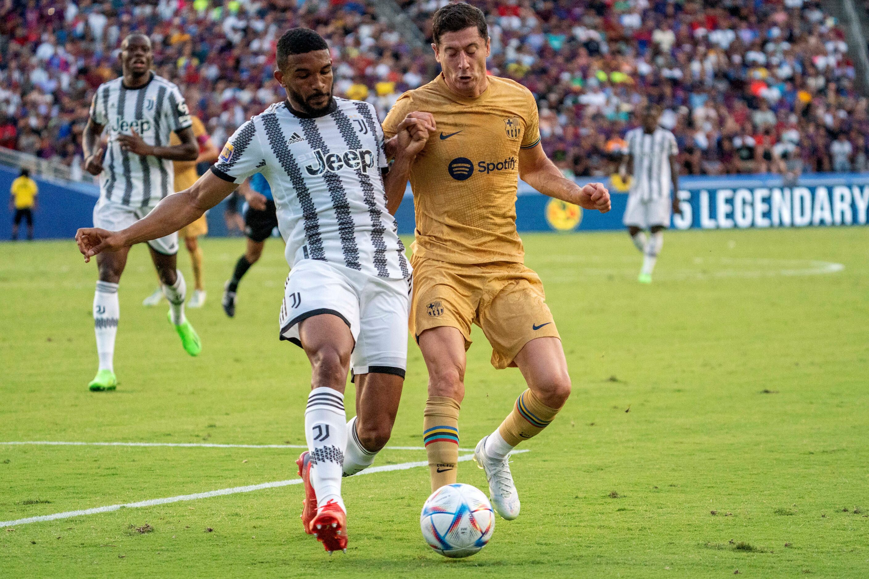 Juventus defender Gleison Bremer Silva Nascimento defends against Barcelona forward Robert...