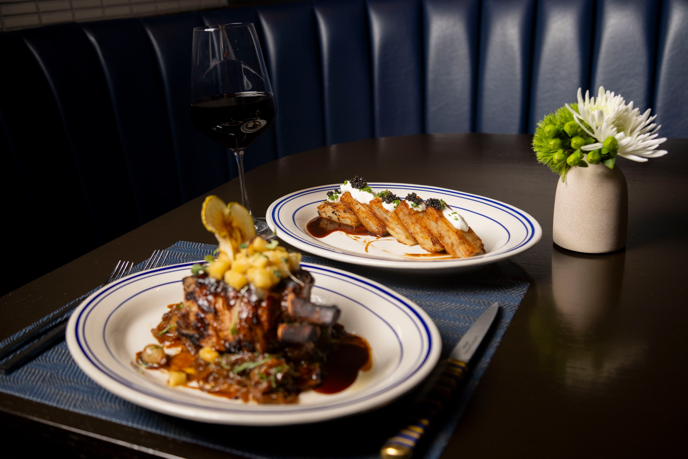 Potato Pave, a side, is photographed with the Berkshire Pork Chop at the Wicked Butcher in...