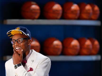 Myles Turner reacts after being selected 10th overall by the Indiana Pacers during the NBA...