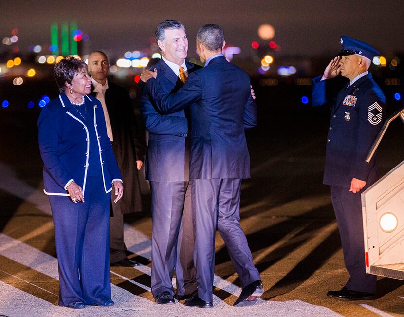  President Obama greets Dallas Mayor Mike Rawlings and U.S. Rep. Eddie Bernice Johnson as he...