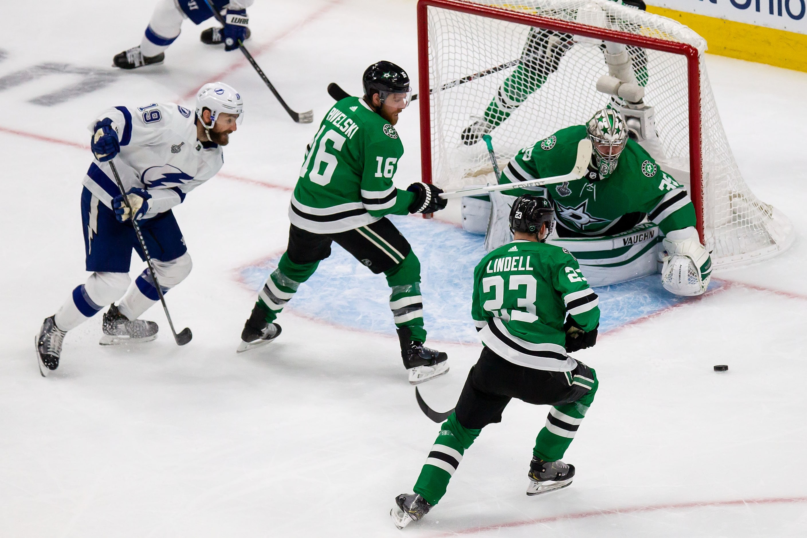 Joe Pavelski (16) and goaltender Anton Khudobin (35) of the Dallas Stars battle against...